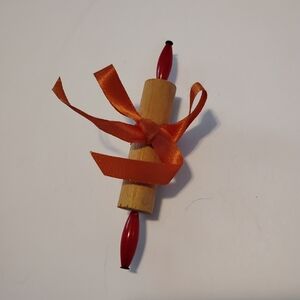Decorative Wooden Scroll with Orange Ribbon